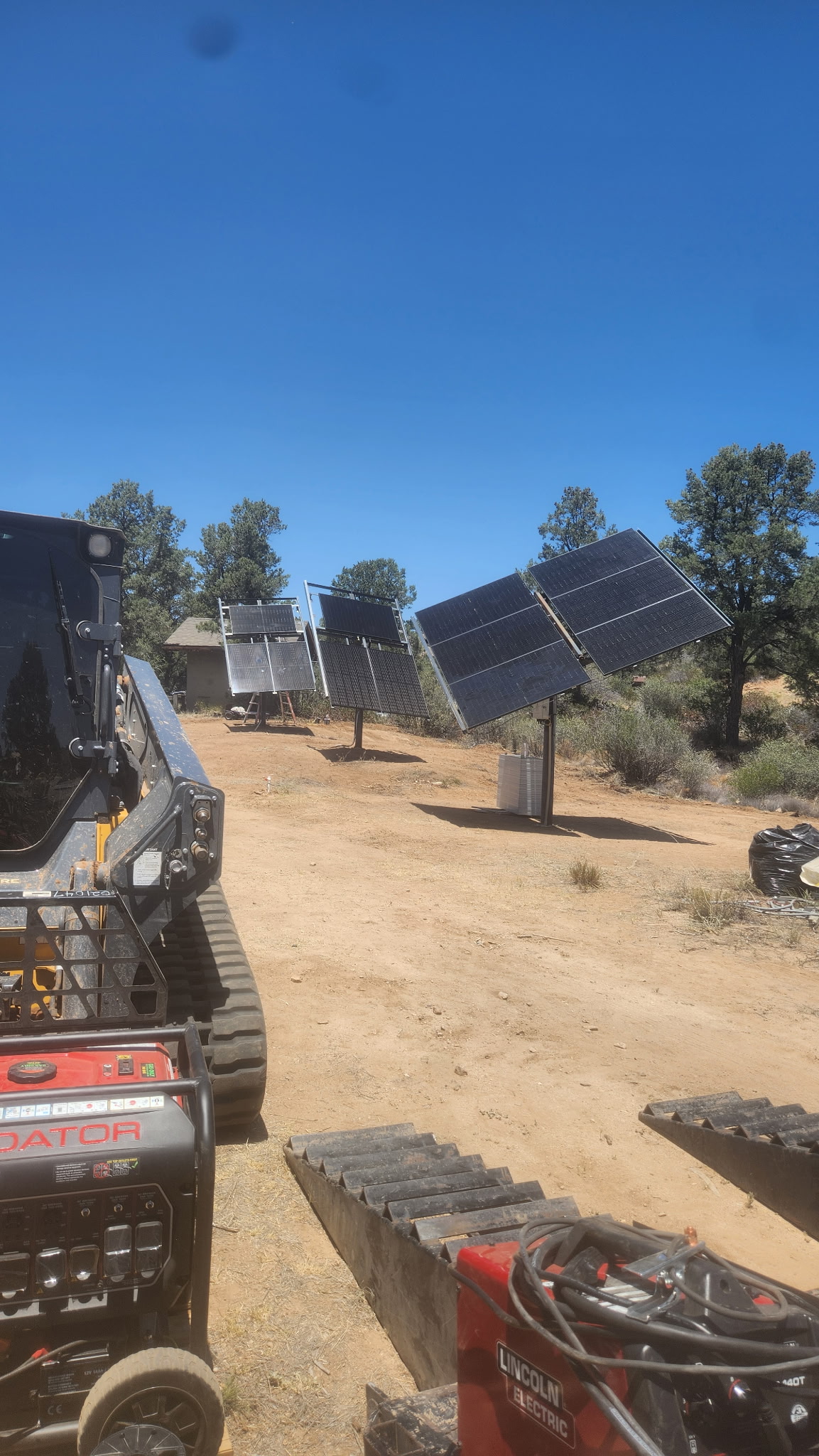 Skid steer at a utility-scale solar jobsite