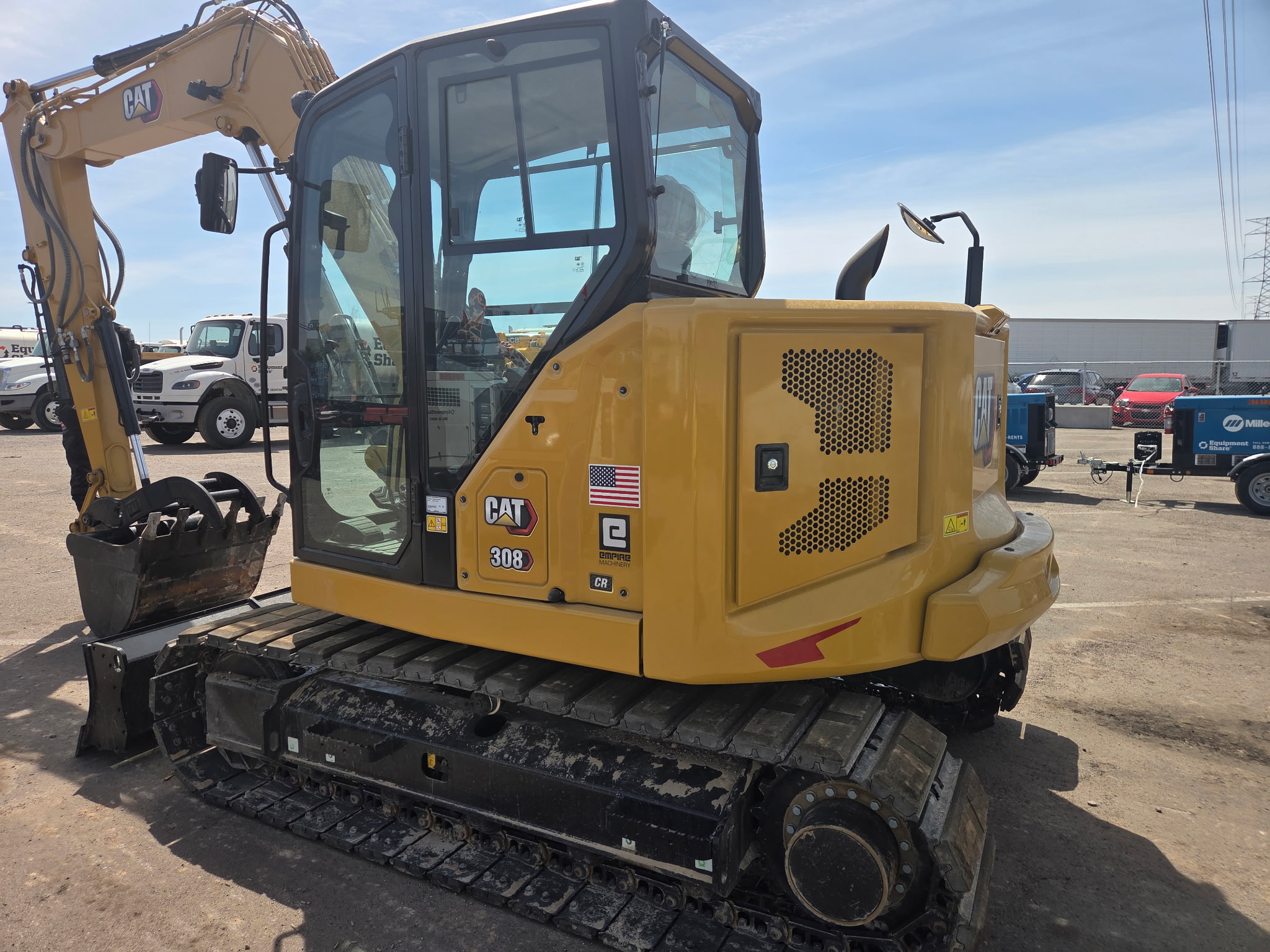 Deere excavator side profile at the yard