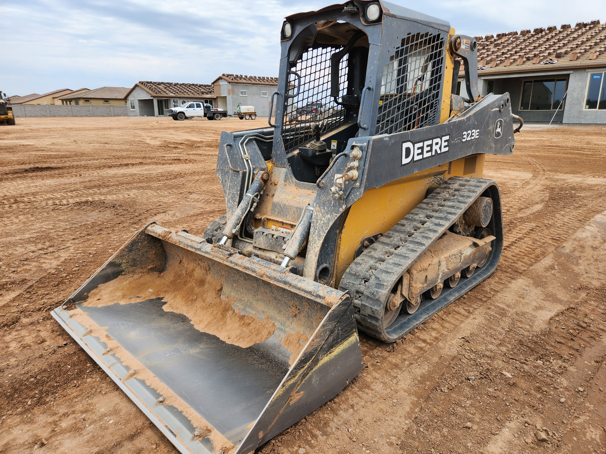 Deere compact track loader, front-on