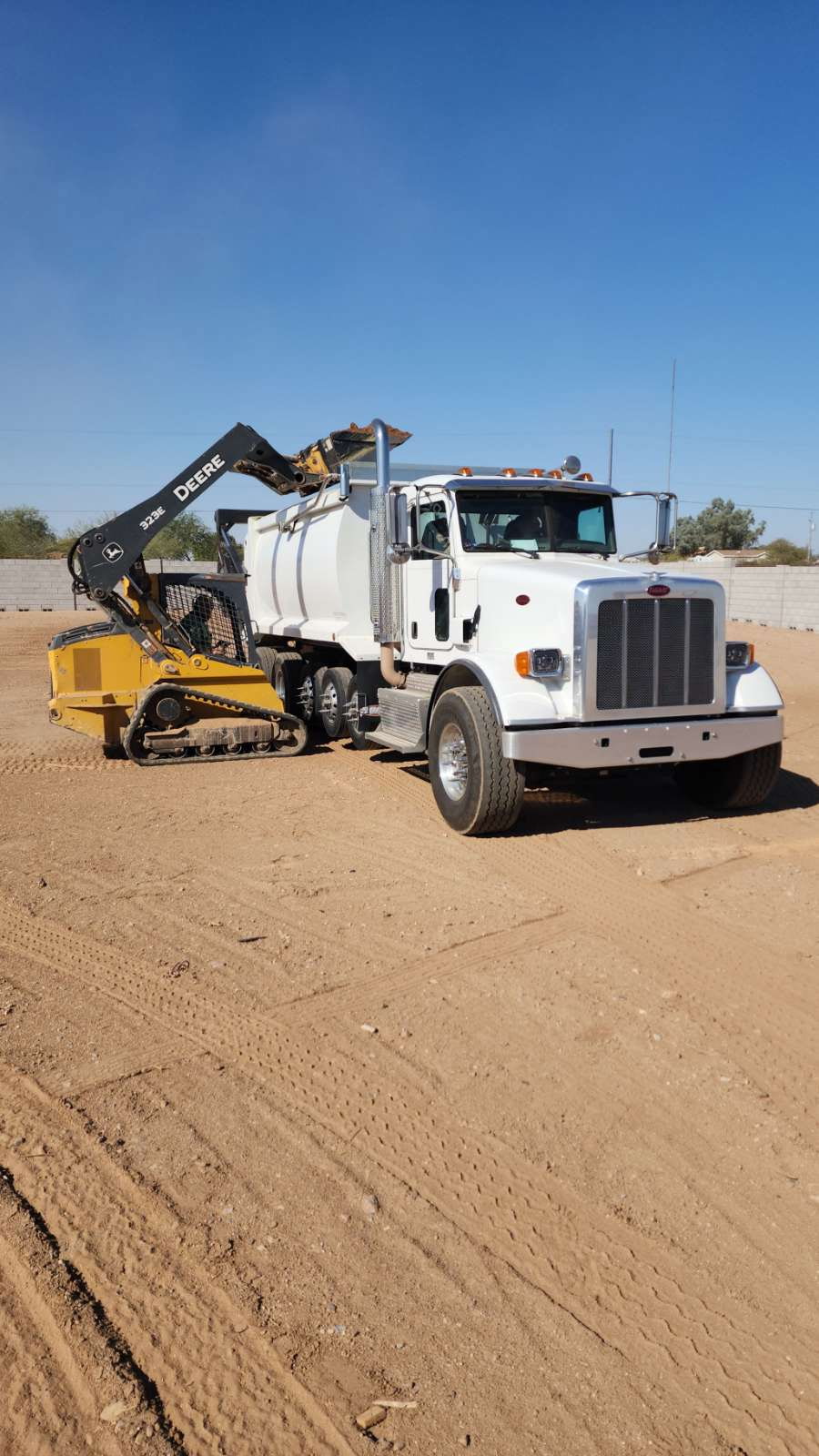 Peterbilt water truck front-on in the desert