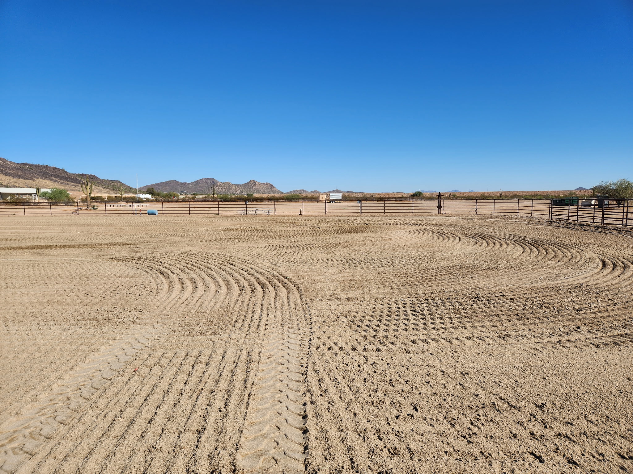 Freshly graded pad with tire-track patterns