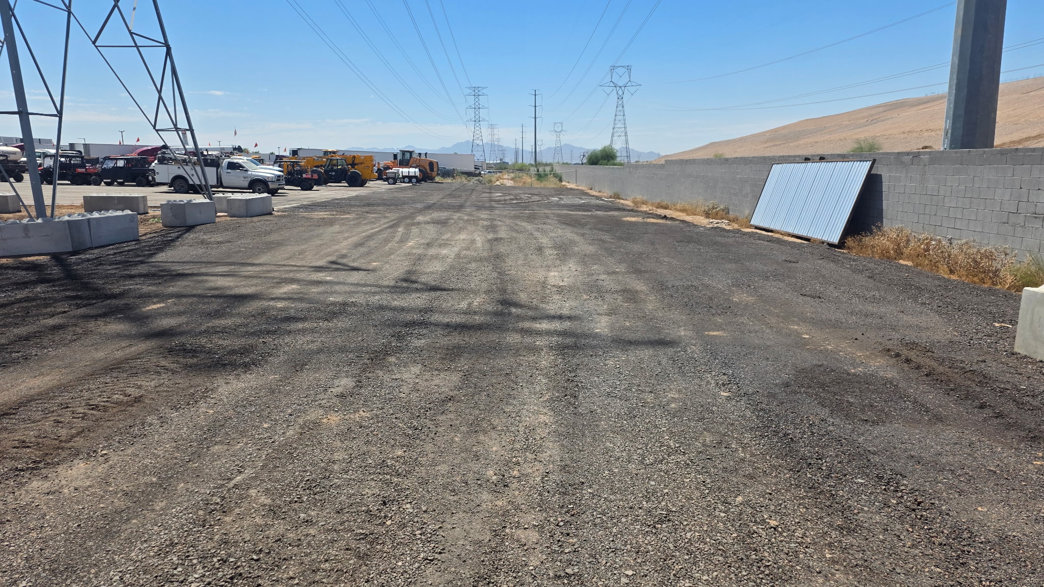 Fresh asphalt paving at a commercial lot